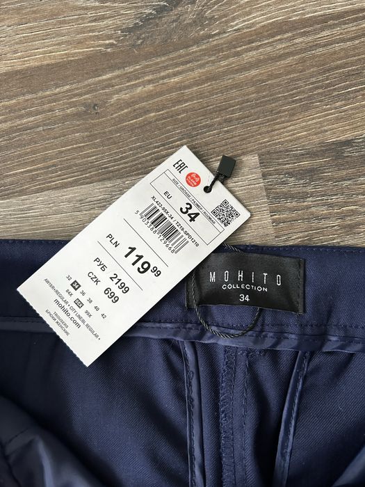 Eleganckie spodnie cygaretki granatowe Mohito