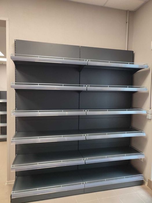 Прилавки та стелажі металеві для магазинів у наявності на складі