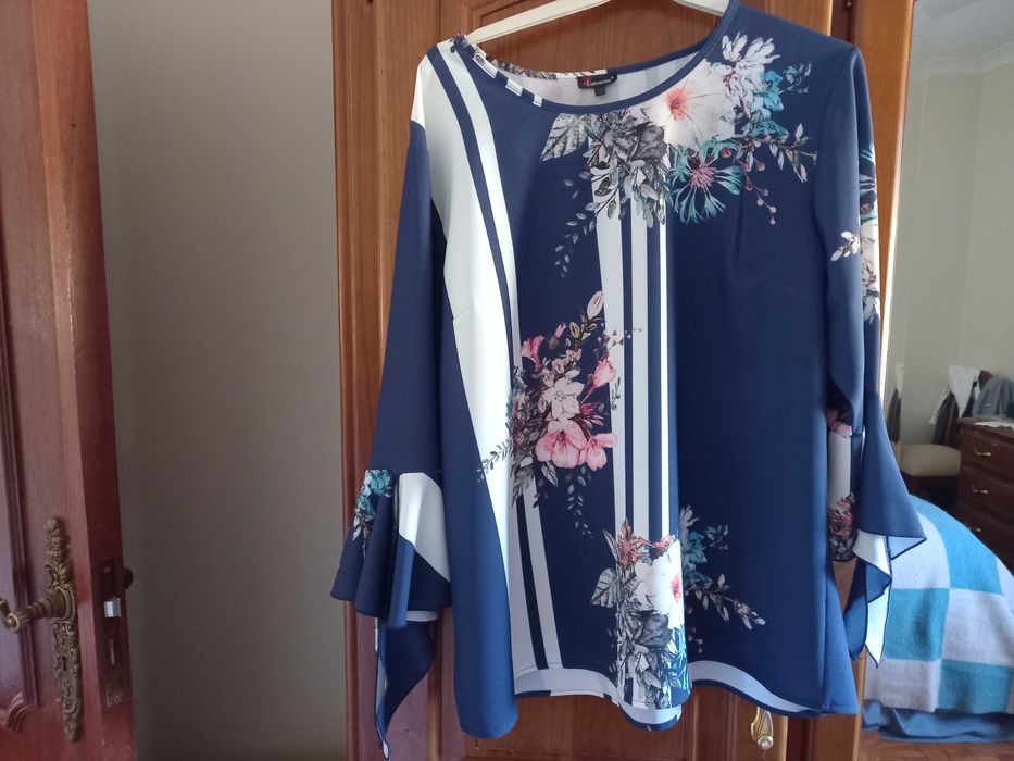 Blusa linda as 3 quartas como nova.