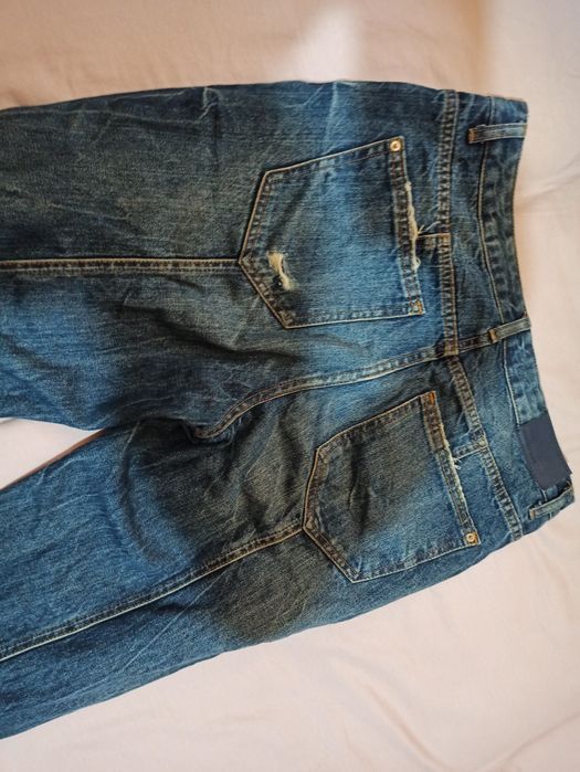 Damskie jeansy 38