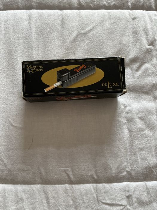 Máquina para enrolar cigarros