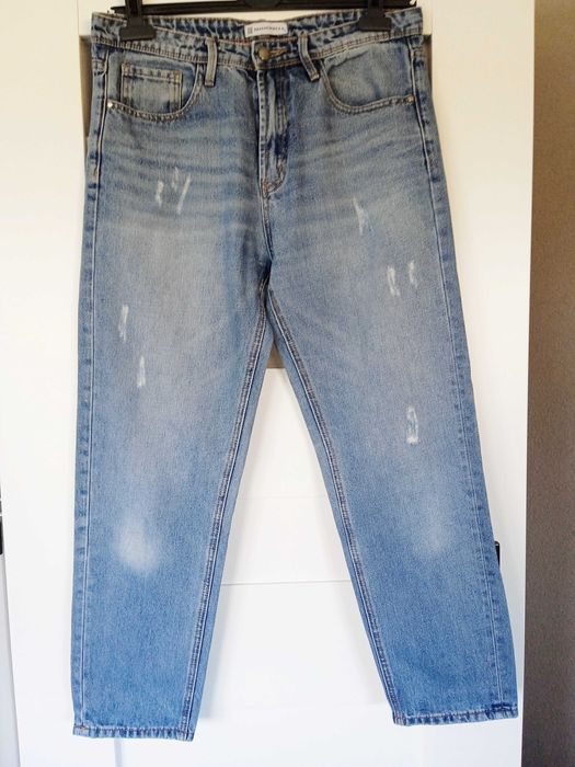 Spodnie jeans - damskie - niebieskie - roz. XL -