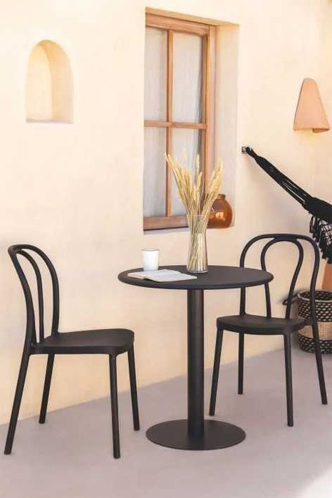 Mesa redonda e 4 cadeiras de jardim Mizzi, qualidade SKLUM cor preta