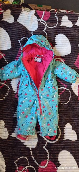 Зимові комбінезони