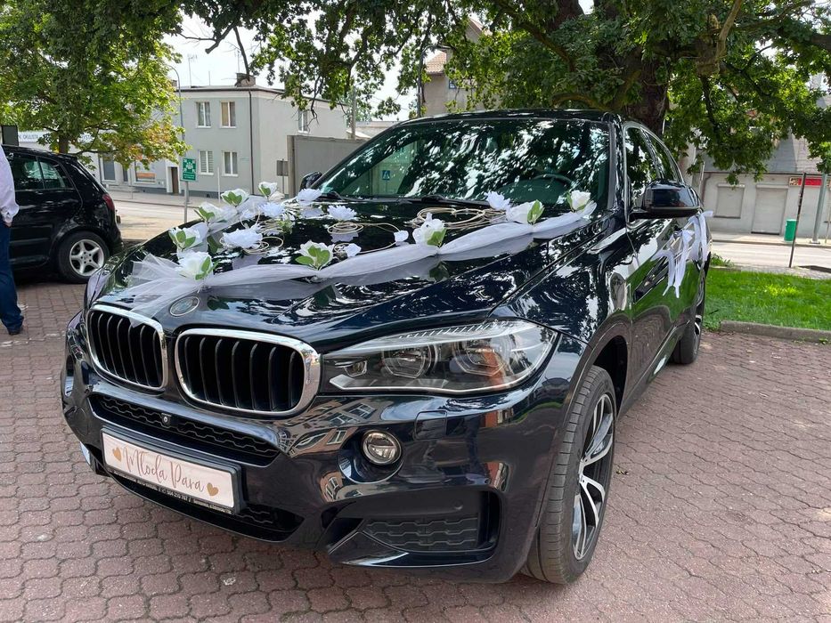 Wynajem auta premium do ślubu Bmw X6 M pakiet , Bmw X5 M pakiet, Tesla Y 2024, Ford Edge 2024, Mercedes E klasa W213 AMG