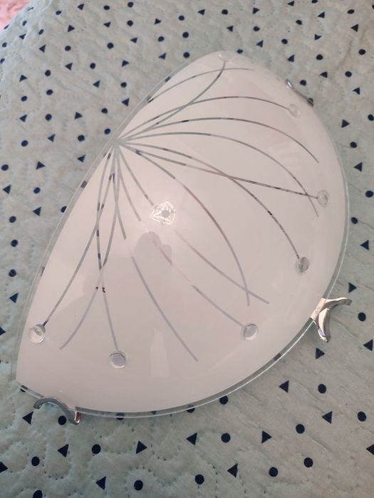 Aplique de parede interior.