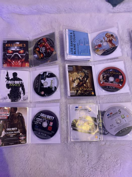 Ps3 Super Slim  500gb c/ 2 comandos e jogos