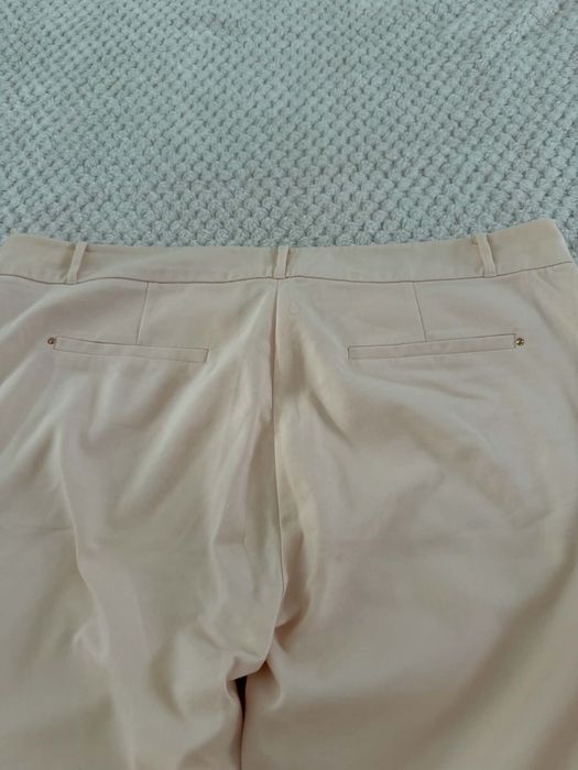 Eleganckie spodnie Reserved rozmiar 42/44.