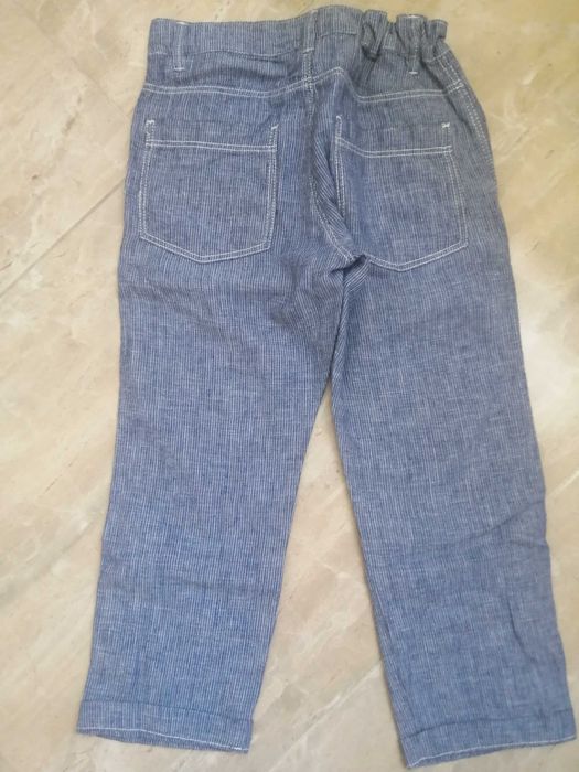 Materiałowe spodnie H&m 116