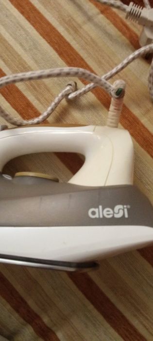 Утюг в рабочем состоянии.