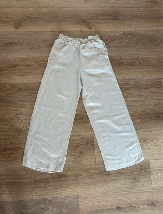 Lniane beżowe spodnie h&m