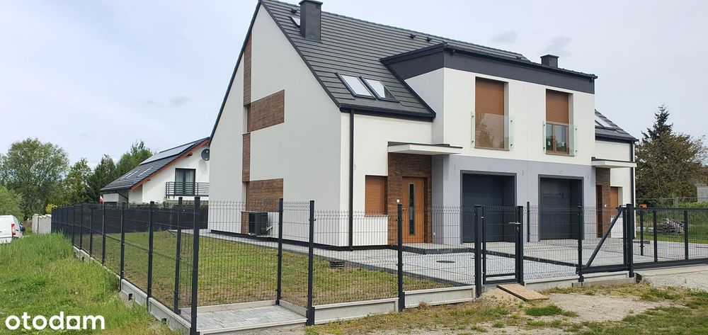 Nowy dom jednorodzinny w zabudowie bliźniaczej