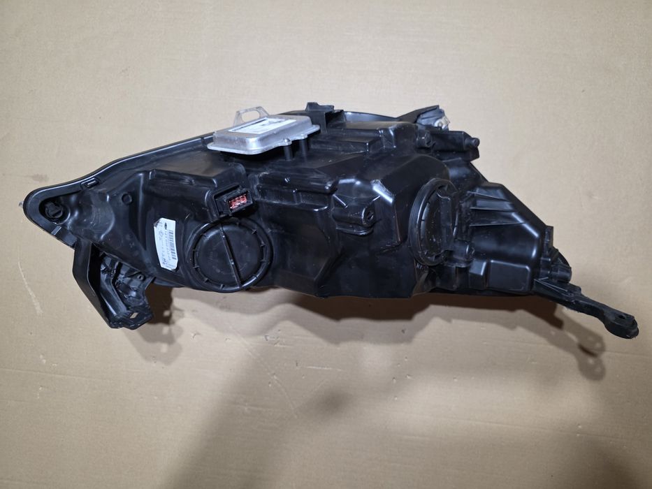 Opel Astra J Lampa przednia 1ZT010012
