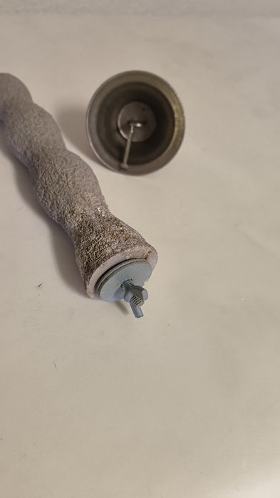 Poleiro e sino para papagaios