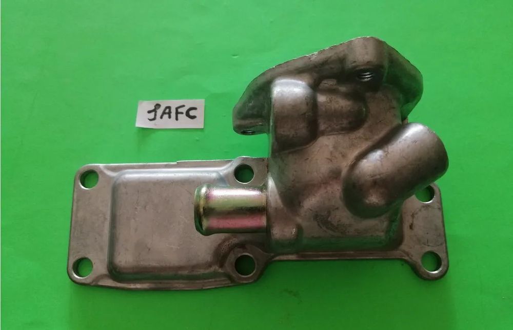 Tampa Falange caixa do termostato Isuzu NKR55 3.3 4BC2 8-94403314-0