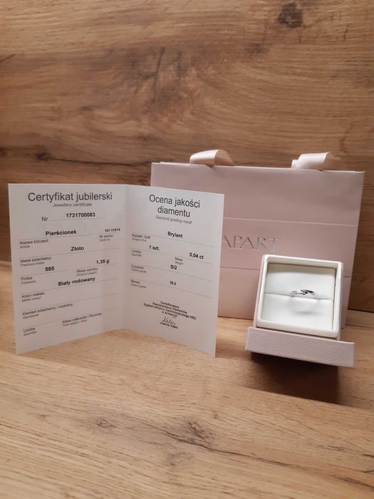 Pierścionek z białego złota z brylantem 0,04 ct próba 585 Apart r. 14