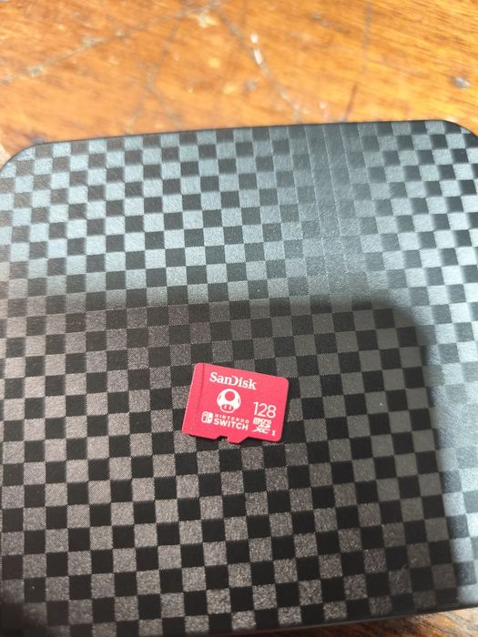 Nintendo switch + cartão 128gb + 2 jogos