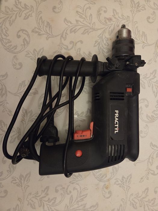 Berbequim com percussão