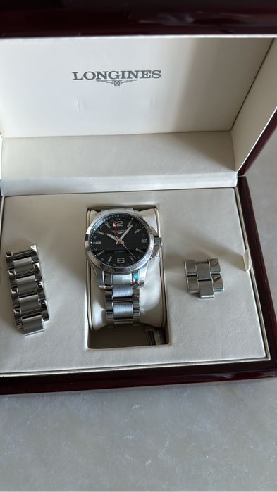Relogio automatico Longines Conquest GMT, referência L3.687.4.566
