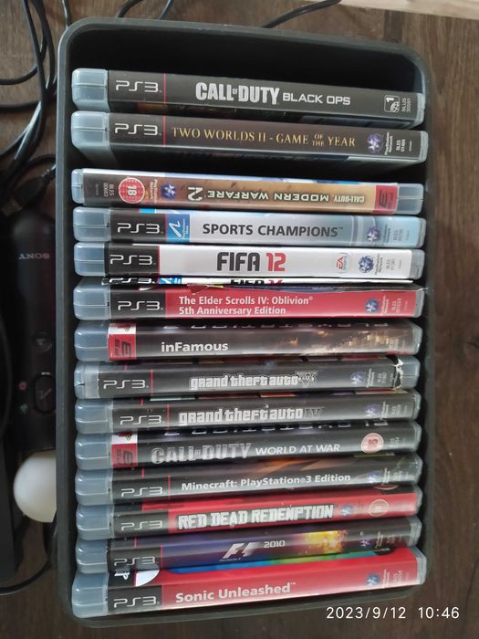 Ps3, dwa pady, kontroler move, kamera. 14 gier