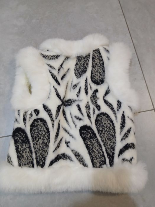 Жилетка без рукавів