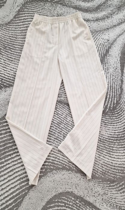 Spodnie szerokie,ecru,paski"H&M".