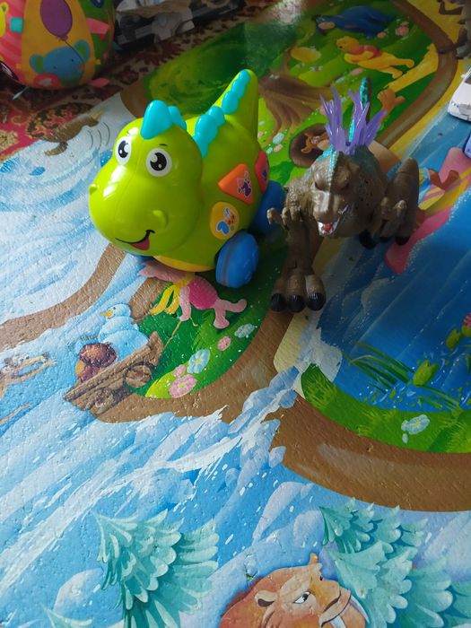 Музичний динозаврик, Музыкальный динозаврик Дино