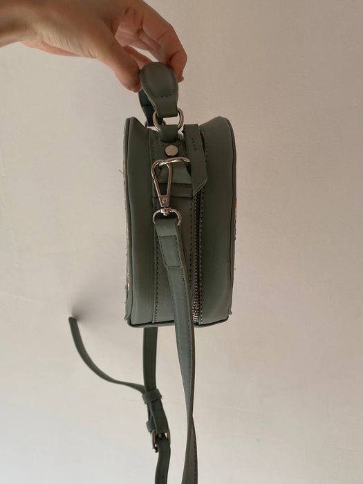 Кругла сумка-клатч