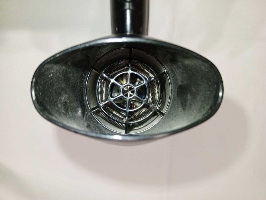 Компактний дорожній фен моделі Remington D1500