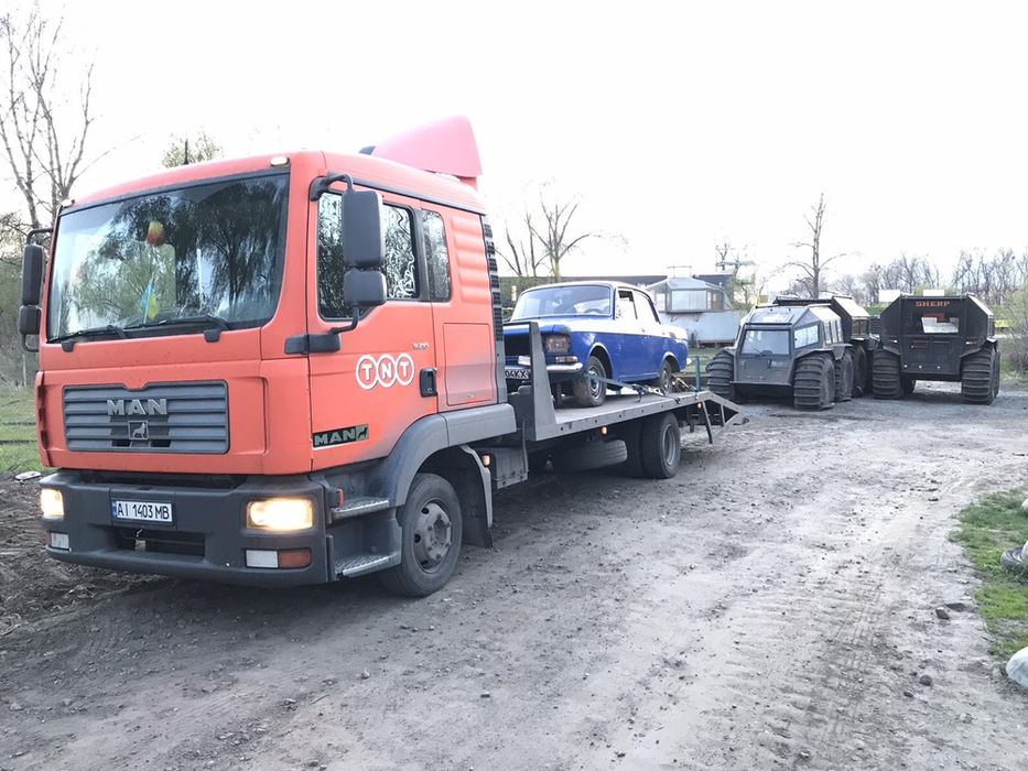 Киев эвакуатор Перевозим Легковые автомобили сельхоз технику