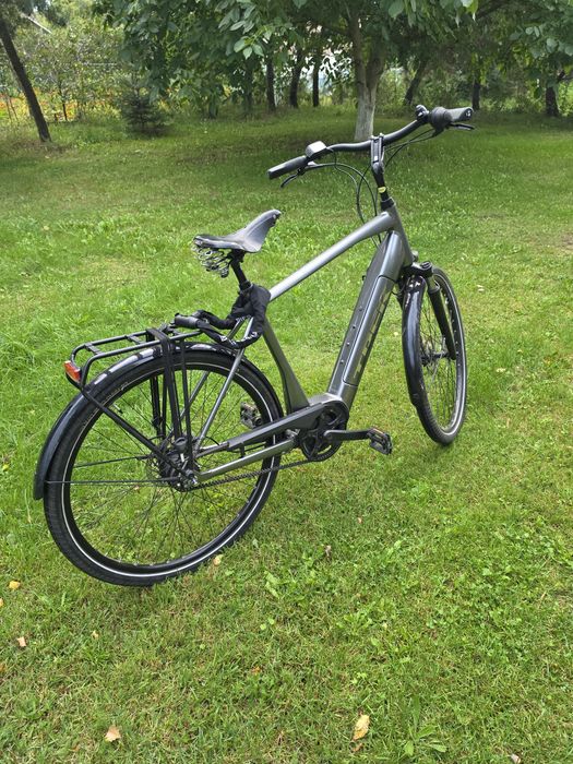 Elekrtyczny TREK District+ 7 – Bosch Active Line Plus 500 Wh – pasek – 2023 – Brooks B135 - Ładowarka Bosch