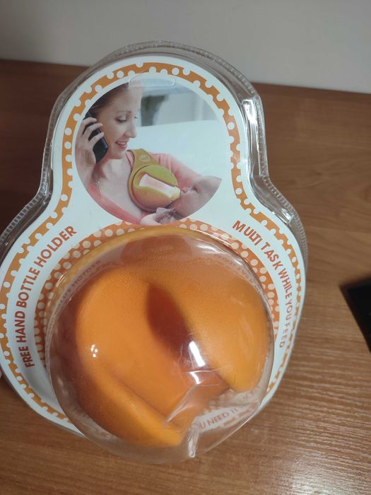 Uchwyt na butelkę do karmienia dziecka – Free Hand Bottle Holder