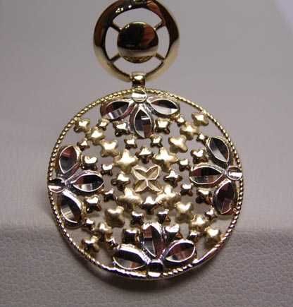 Złota dwukolorowa zawieszka ruchome elementy.