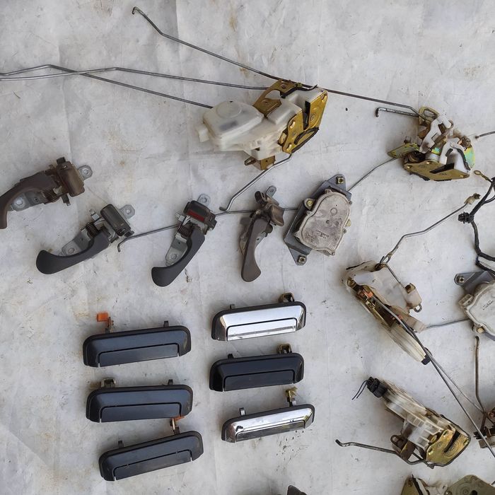 Замок  ручка дверей Mitsubishi Pajero Sport 1998-08