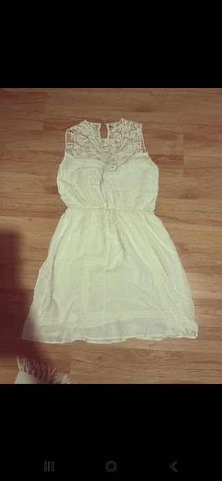 Biała sukienka midi