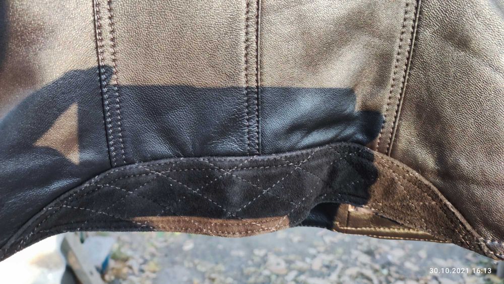 Новая кожанная женская, коричневая  курточка