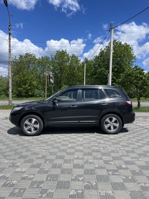 Hyundai Santa FE 2009 VIN KMHSH81WP9U445683 фото оголошення 3 з 8