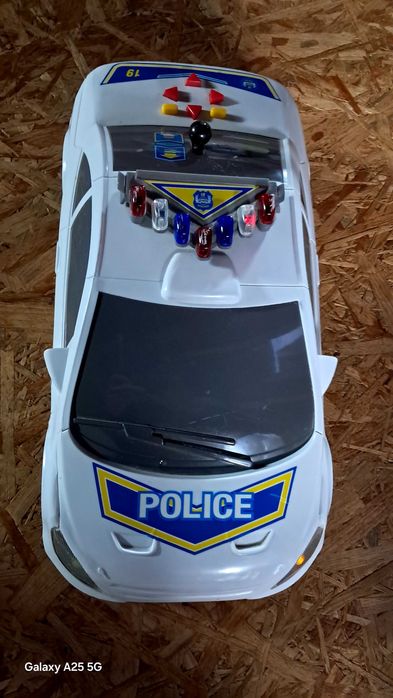 Samochód policyjny- świeci i gra DUŻY