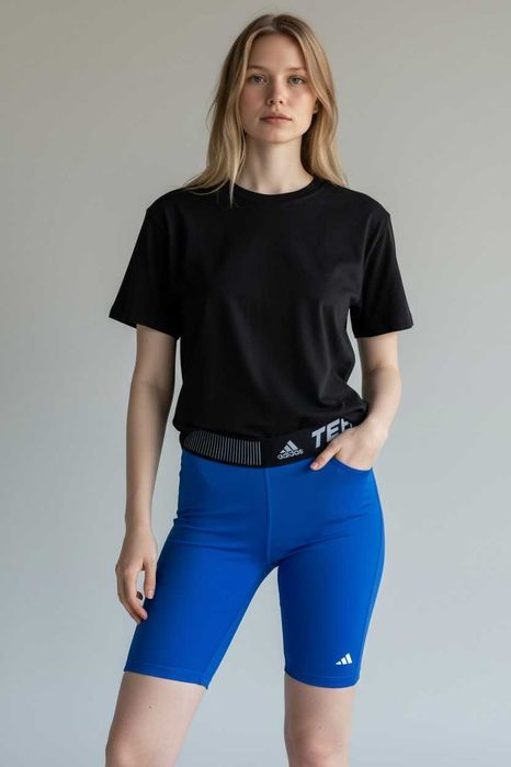 E31 treningowe spodenki damskie ADIDAS kolarki termo niebieskie XS 34