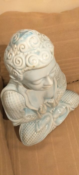 Buda em louça azul