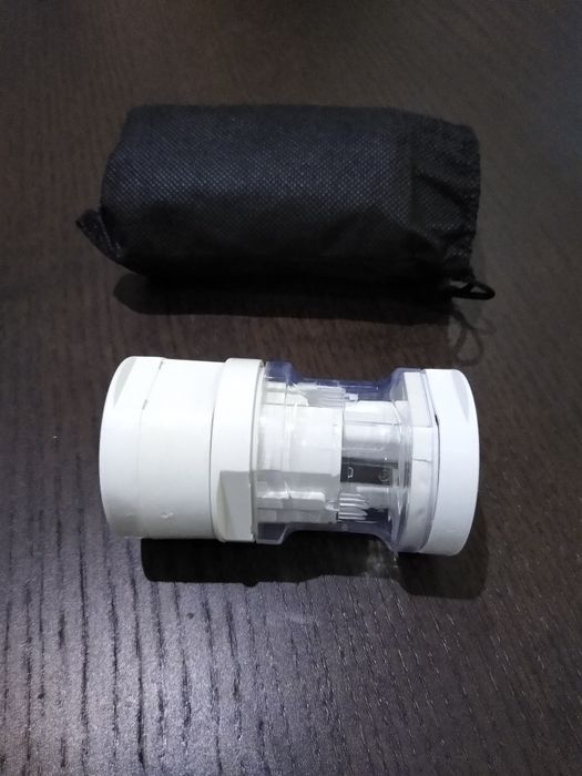 Adaptador de viagem universal