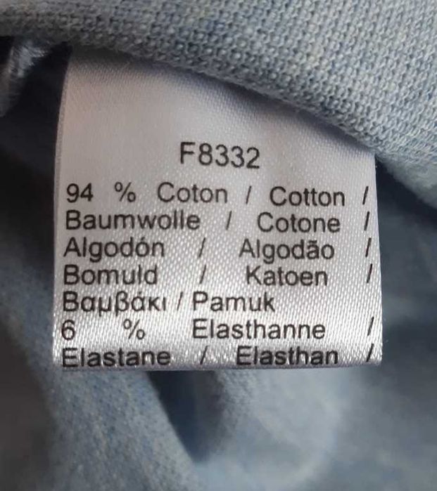 Поло голубое меланж Lacoste