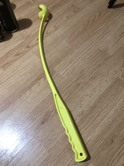 Brinquedo para atirar bola cão