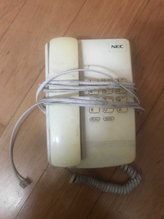 Telefone fixo com teclas + telefone portátil sem fios