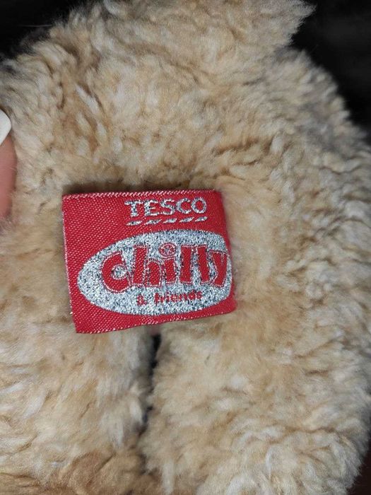 Лежачая рождественская собака tesco chilly
