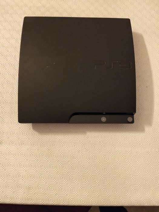 PS3 Slim + jogos