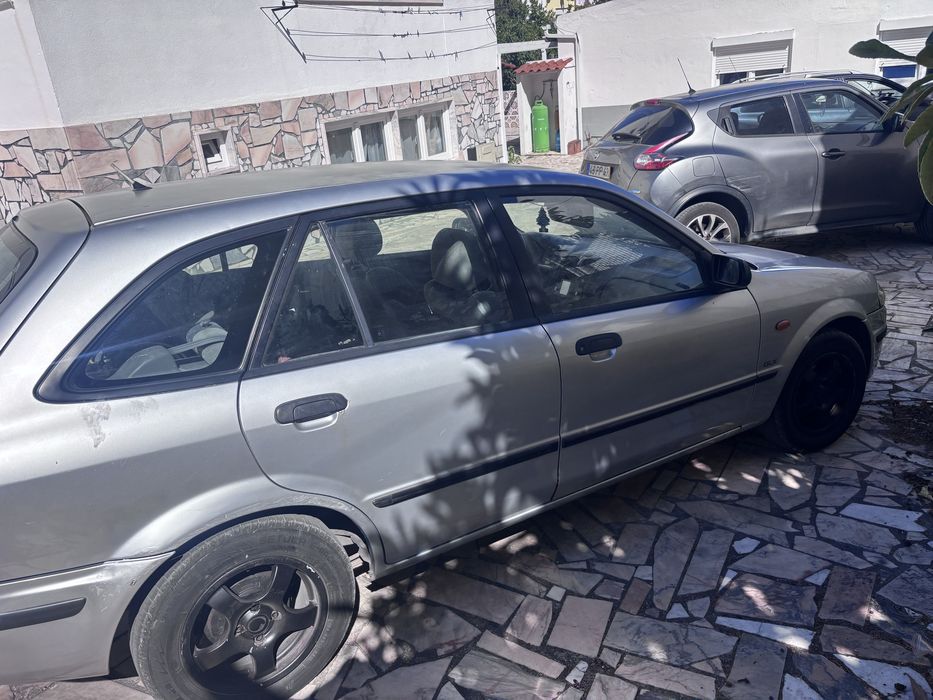 Mazda 323 ano 99