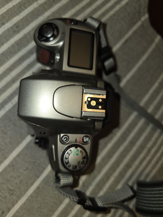 Máquina Nikon f65 como Nova