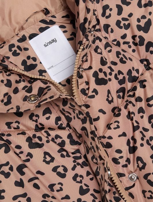 Стьобана куртка-пуффер з капішоном Sinsay