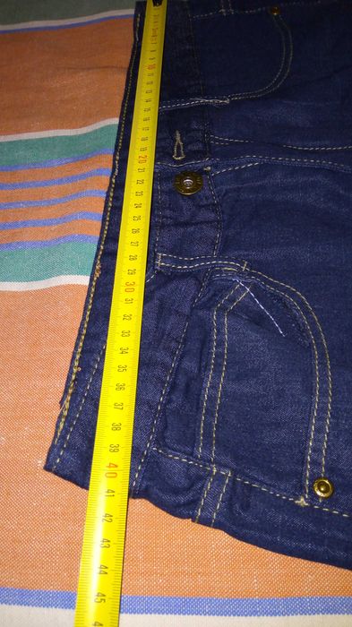 Продам новые джинсовые летние брюки.